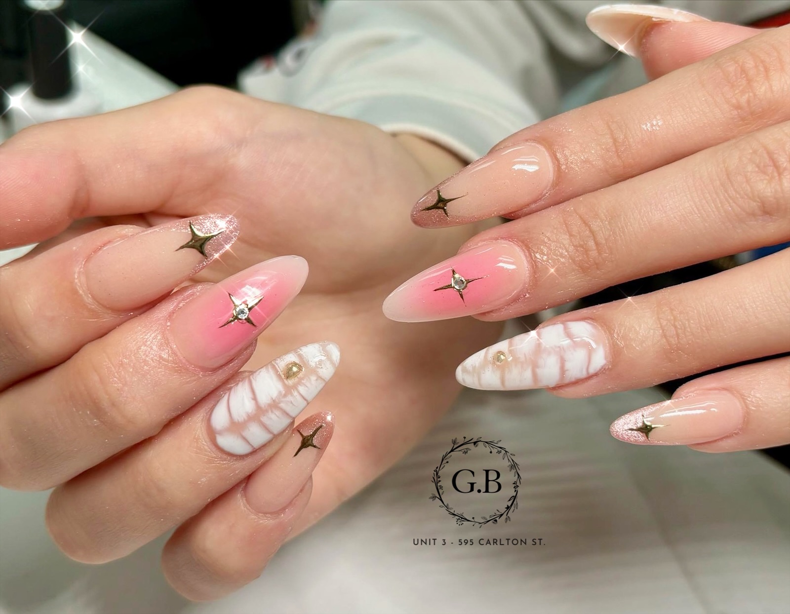 Pink and white Gloss 'n Blink nail art